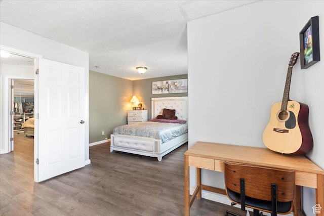 6268 S Faber Ln, Taylorsville, UT 84123 - bedroom with baseboards and wood finished floors