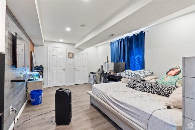 6268 S Faber Ln, Taylorsville, UT 84123 - bedroom featuring baseboards, recessed lighting, wood finished floors, and visible vents