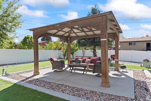 6268 S Faber Ln, Taylorsville, UT 84123 - view of patio featuring a gazebo, a fenced backyard, and an outdoor hangout area