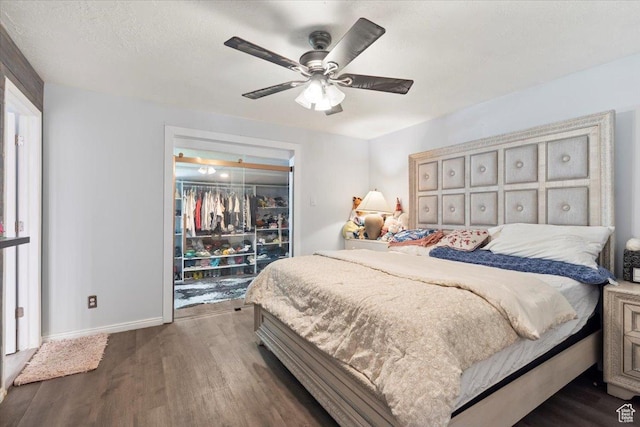 6268 S Faber Ln, Taylorsville, UT 84123 - bedroom featuring baseboards, a ceiling fan, and dark wood-style flooring