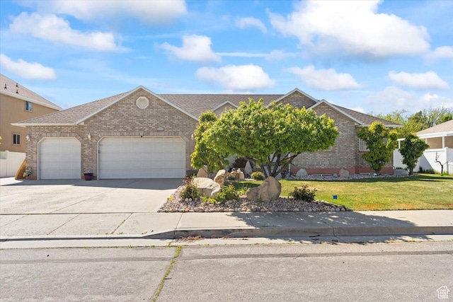 6268 S Faber Ln, Taylorsville, UT 84123 - view of front facade featuring driveway, a garage, brick siding, a front lawn, and a shingled roof