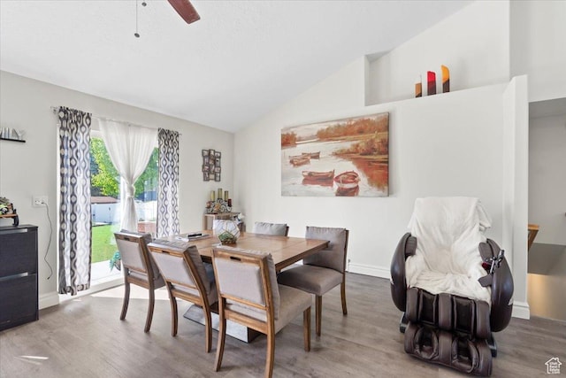 6268 S Faber Ln, Taylorsville, UT 84123 - dining area with baseboards, vaulted ceiling, and wood finished floors