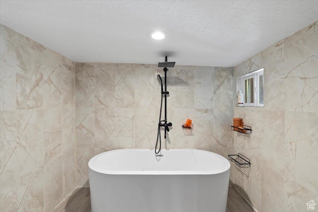 6268 S Faber Ln, Taylorsville, UT 84123 - full bath featuring a freestanding tub, walk in shower, wood finished floors, and tile walls