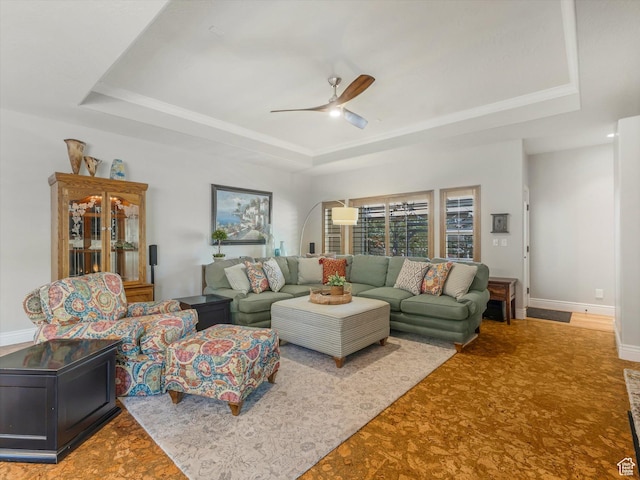 11606 S Radience Ln W, South Jordan, UT 84009 - carpeted living area with baseboards, a ceiling fan, and a raised ceiling