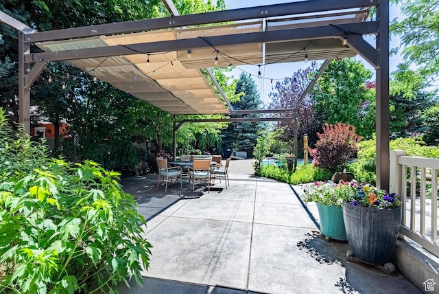11606 S Radience Ln W, South Jordan, UT 84009 - view of patio featuring a pergola and outdoor dining space