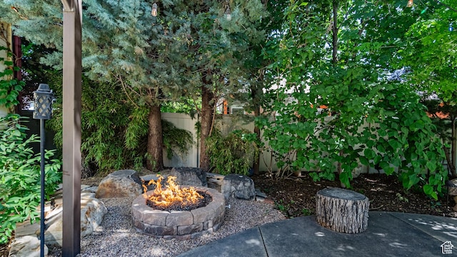 11606 S Radience Ln W, South Jordan, UT 84009 - view of patio / terrace featuring a fire pit