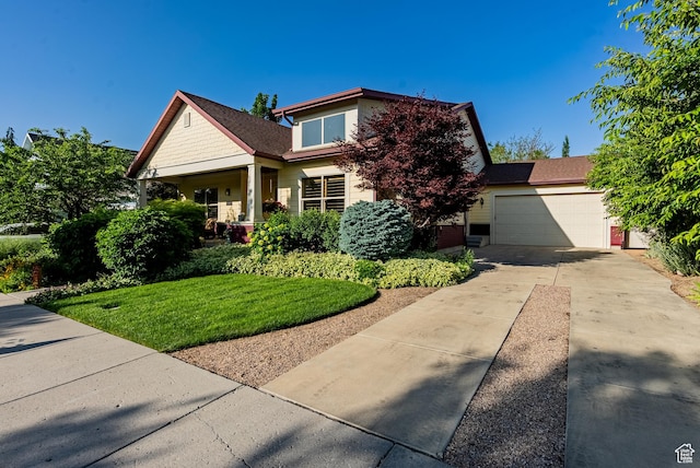 11606 S Radience Ln W, South Jordan, UT 84009 - view of front of property with a garage, concrete driveway, and a front lawn