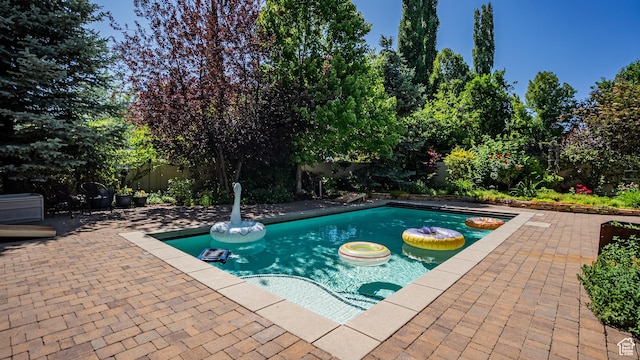 11606 S Radience Ln W, South Jordan, UT 84009 - view of pool featuring a patio area and a fenced backyard