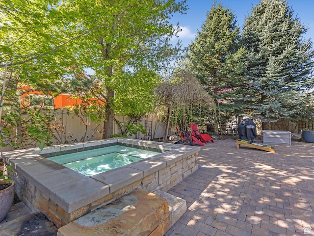 11606 S Radience Ln W, South Jordan, UT 84009 - view of swimming pool with an in ground hot tub, a fenced backyard, and a patio area