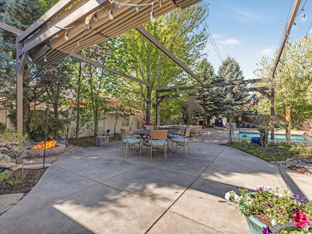 11606 S Radience Ln W, South Jordan, UT 84009 - view of patio / terrace featuring a fire pit, an outdoor pool, fence, and outdoor dining space