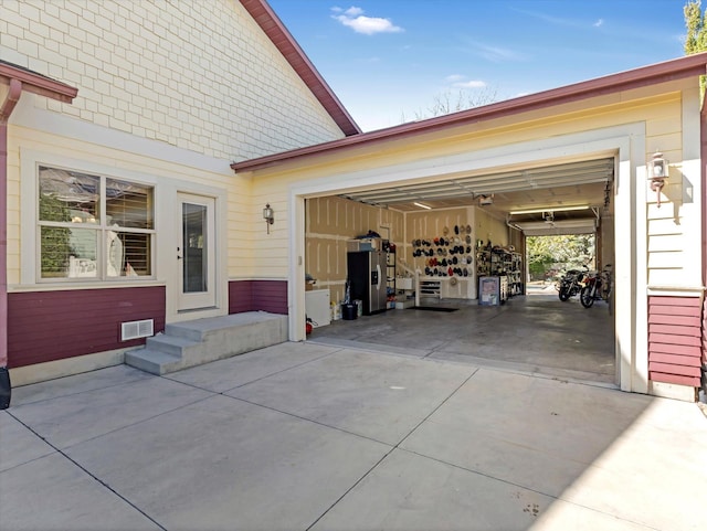 11606 S Radience Ln W, South Jordan, UT 84009 - garage featuring visible vents and concrete driveway