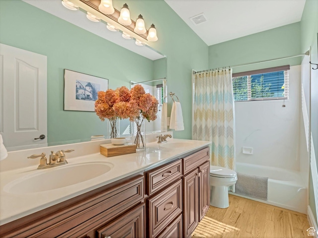 11606 S Radience Ln W, South Jordan, UT 84009 - full bathroom featuring a sink, double vanity, toilet, and wood finished floors