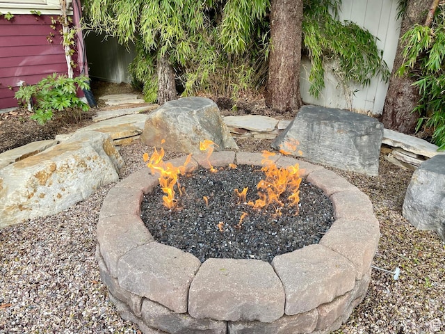 11606 S Radience Ln W, South Jordan, UT 84009 - view of yard with an outdoor fire pit