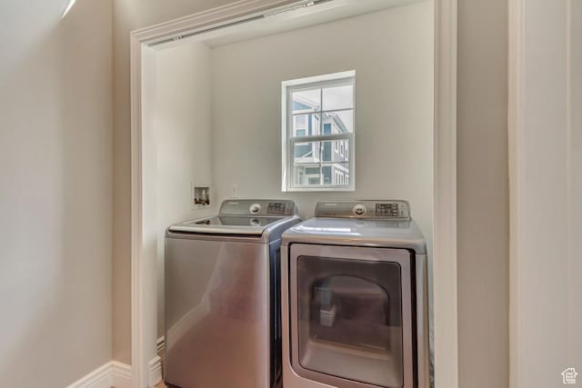 145 E Majestic Elms Pl S, South Salt Lake, UT 84115 - clothes washing area featuring washer and clothes dryer