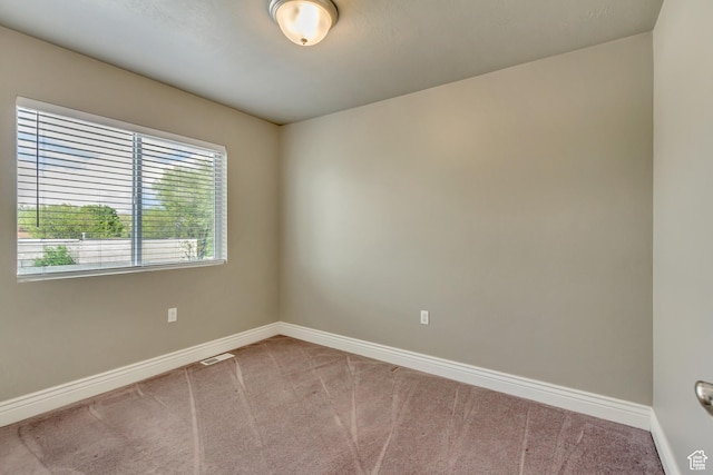145 E Majestic Elms Pl S, South Salt Lake, UT 84115 - carpeted empty room with baseboards and visible vents