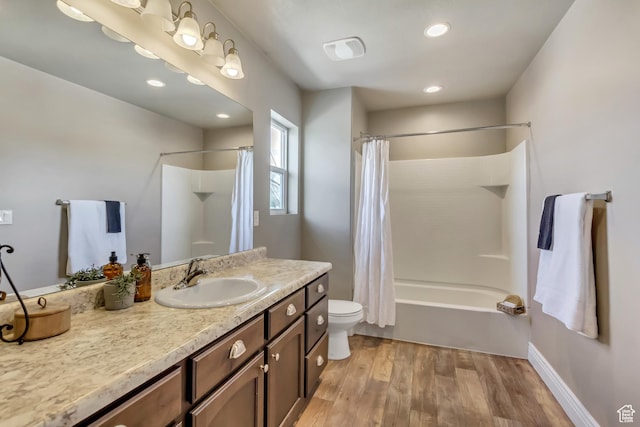145 E Majestic Elms Pl S, South Salt Lake, UT 84115 - full bath featuring vanity, wood finished floors, shower / bath combination with curtain, toilet, and recessed lighting