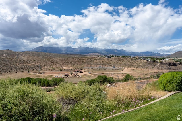 mountain view featuring a rural view