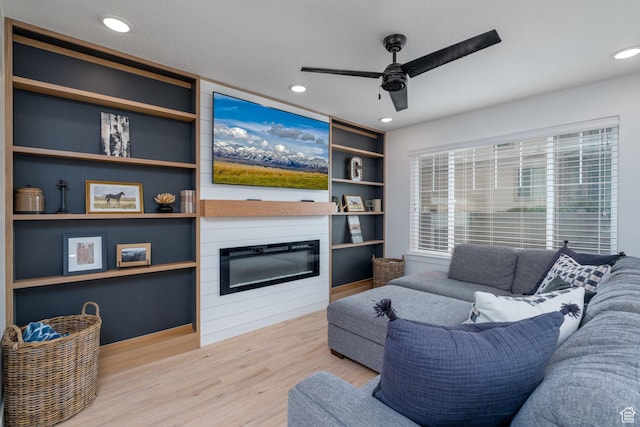 2046 W 1100 N, Provo, UT 84604 - living room featuring a ceiling fan, recessed lighting, a large fireplace, and wood finished floors