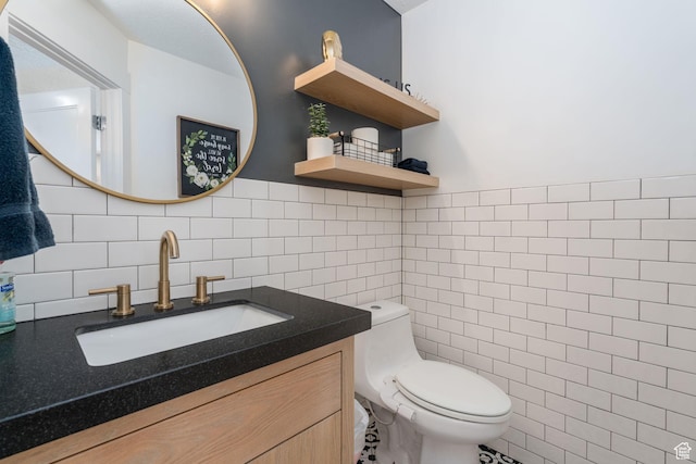 2046 W 1100 N, Provo, UT 84604 - bathroom featuring tile walls, vanity, and toilet