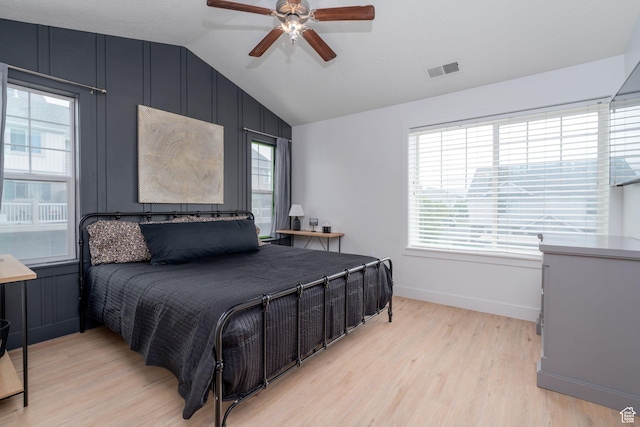 2046 W 1100 N, Provo, UT 84604 - bedroom with light wood-style floors, multiple windows, vaulted ceiling, and visible vents