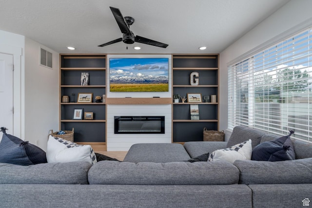 2046 W 1100 N, Provo, UT 84604 - living room with visible vents, built in features, a fireplace, ceiling fan, and recessed lighting