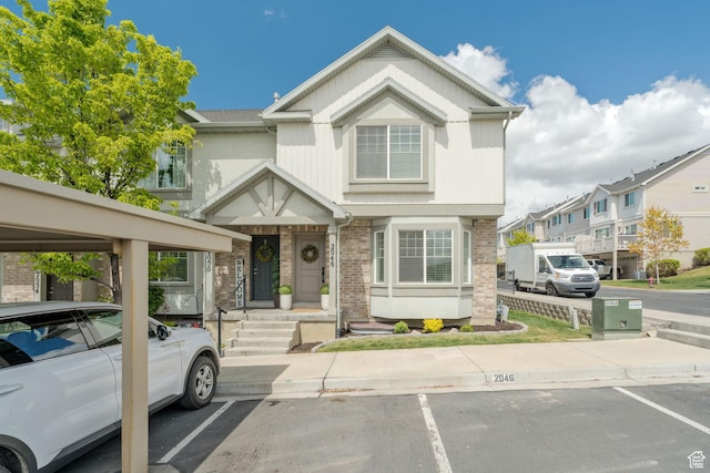 2046 W 1100 N, Provo, UT 84604 - view of property featuring brick siding and uncovered parking