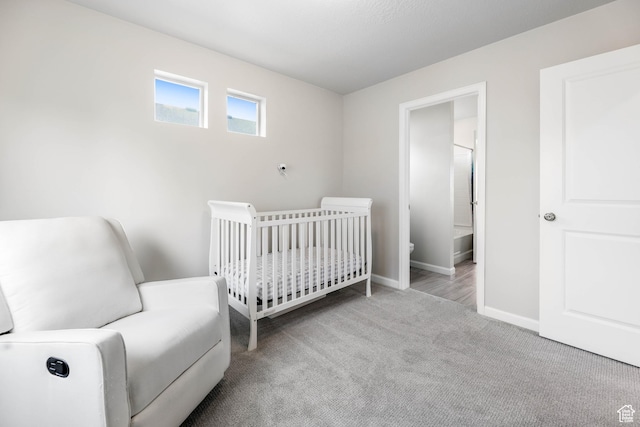 134 E Stroll Ave Unit 816, Saratoga Springs, UT 84045 - bedroom featuring baseboards, carpet, and a crib