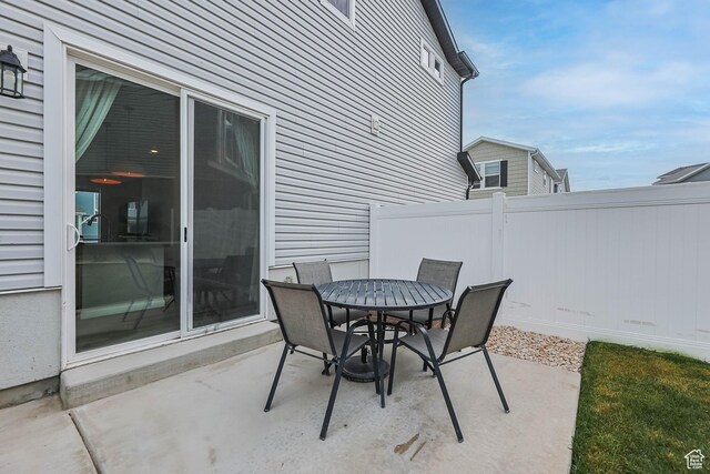 134 E Stroll Ave Unit 816, Saratoga Springs, UT 84045 - view of patio / terrace with fence and outdoor dining area