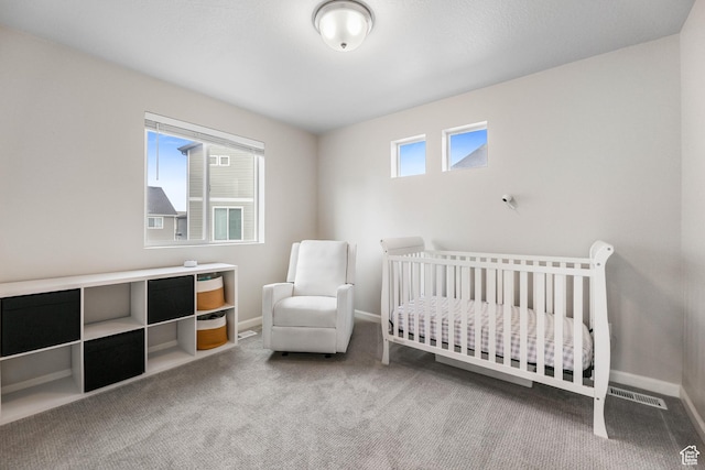 134 E Stroll Ave Unit 816, Saratoga Springs, UT 84045 - carpeted bedroom with baseboards, a nursery area, and visible vents