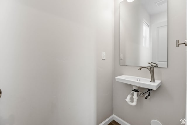 134 E Stroll Ave Unit 816, Saratoga Springs, UT 84045 - bathroom with baseboards and a sink