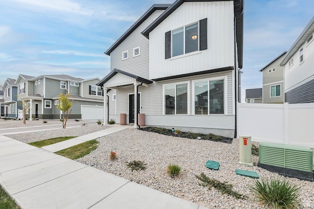 134 E Stroll Ave Unit 816, Saratoga Springs, UT 84045 - view of front facade with fence and a residential view
