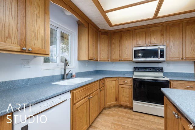 2732 S 4550 W, Taylor, UT 84401 - kitchen featuring a sink, dishwasher, stainless steel microwave, light wood-type flooring, and range with electric stovetop