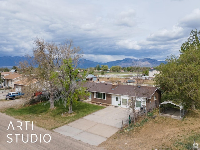 2732 S 4550 W, Taylor, UT 84401 - single story home featuring driveway, a front lawn, a mountain view, and a carport