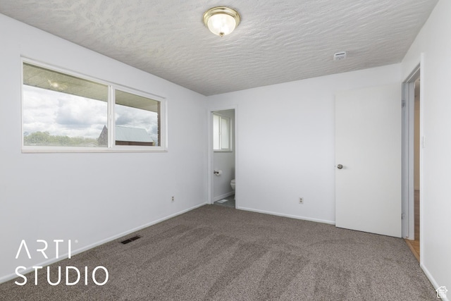 2732 S 4550 W, Taylor, UT 84401 - carpeted empty room with baseboards, a textured ceiling, and visible vents