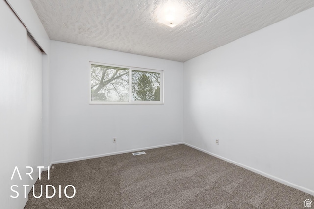 2732 S 4550 W, Taylor, UT 84401 - carpeted spare room featuring baseboards, a textured ceiling, and visible vents