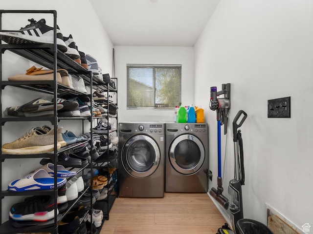 2265 W Marvinwood Dr S, Taylorsville, UT 84129 - clothes washing area featuring laundry area, light wood-style flooring, and independent washer and dryer