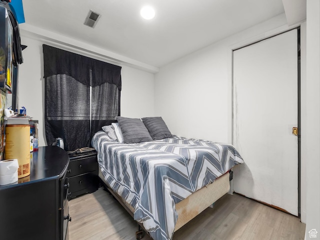 2265 W Marvinwood Dr S, Taylorsville, UT 84129 - bedroom featuring light wood-type flooring and visible vents