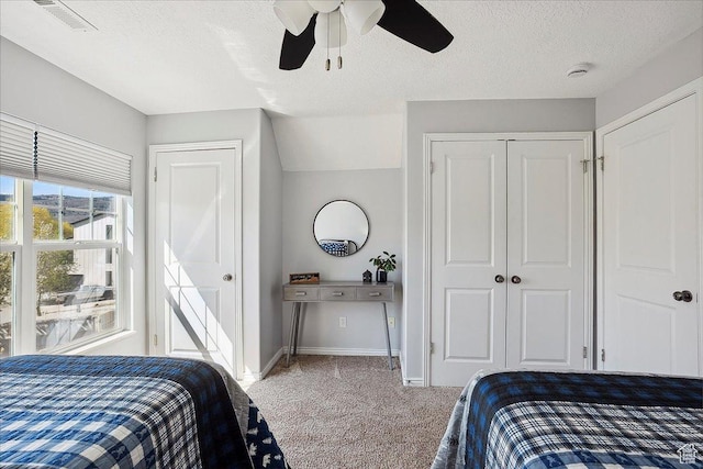 3511 N Willow Creek Ln E Unit 10, Eden, UT 84310 - carpeted bedroom with baseboards, a ceiling fan, a textured ceiling, and visible vents