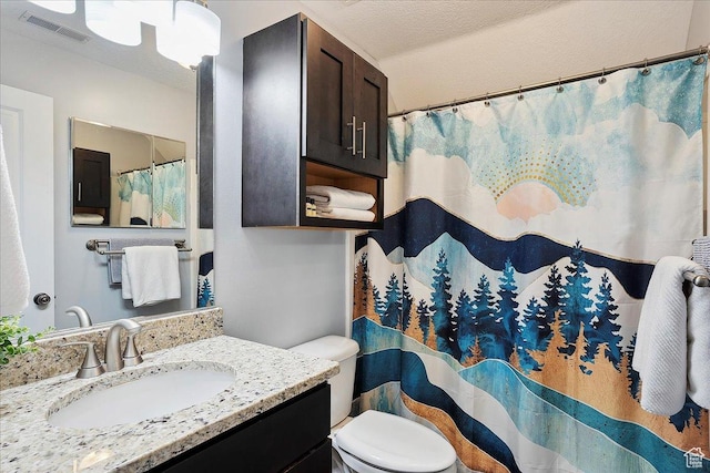 3511 N Willow Creek Ln E Unit 10, Eden, UT 84310 - bathroom with visible vents, a shower with shower curtain, toilet, and vanity
