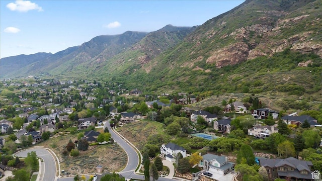 aerial view with a mountain view and a residential view