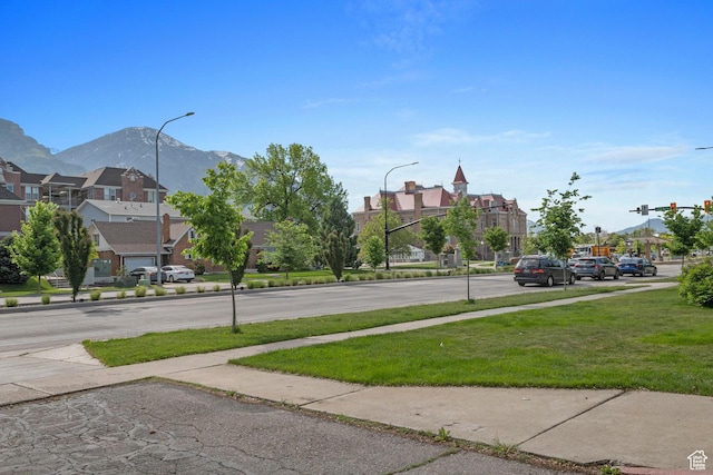 639 N University Ave Unit 2, Provo, UT 84601 - view of road with traffic lights, street lights, sidewalks, a mountain view, and a residential view