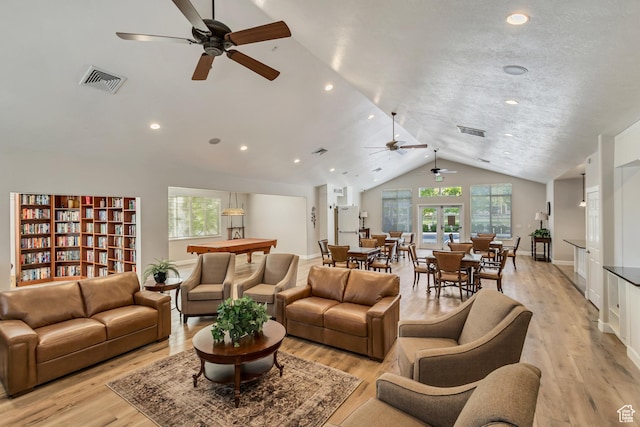 1889 S 910 W Unit B, Syracuse, UT 84075 - living room featuring visible vents, a ceiling fan, vaulted ceiling, and a wealth of natural light