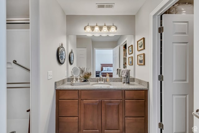 1889 S 910 W Unit B, Syracuse, UT 84075 - bathroom with vanity, connected bathroom, and visible vents