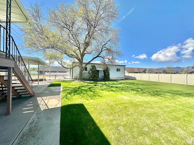 56 S 700 E, Hyrum, UT 84319 - view of yard featuring stairway and a patio area