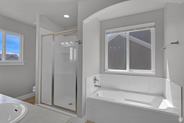 1350 S 849 W Unit 17D, Springville, UT 84663 - bathroom with a shower stall, a bath, baseboards, a sink, and toilet