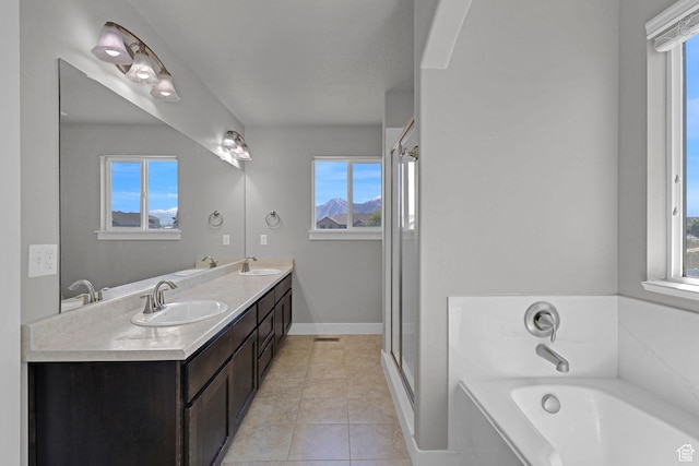 1350 S 849 W Unit 17D, Springville, UT 84663 - bathroom with a garden tub, tile patterned flooring, double vanity, baseboards, and a stall shower