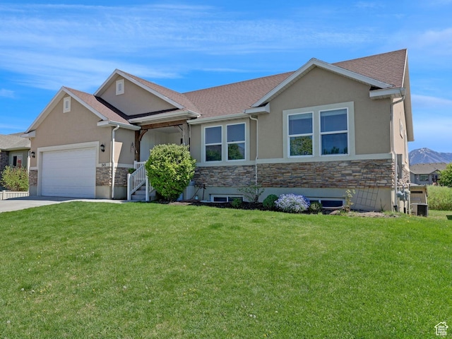 1350 S 849 W Unit 17D, Springville, UT 84663 - view of front of home with stone siding, stucco siding, an attached garage, and a front yard