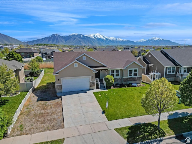 1350 S 849 W Unit 17D, Springville, UT 84663 - ranch-style house featuring stone siding, a residential view, a garage, and driveway