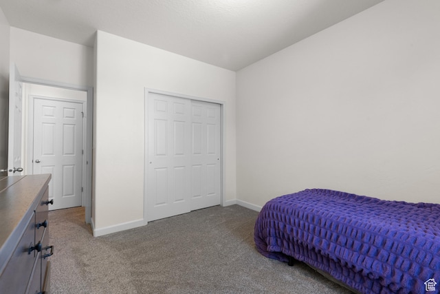 carpeted bedroom with baseboards