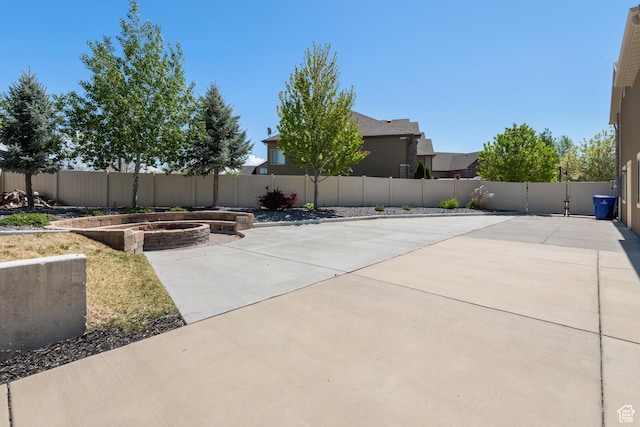 view of patio / terrace with a fenced backyard and a vegetable garden